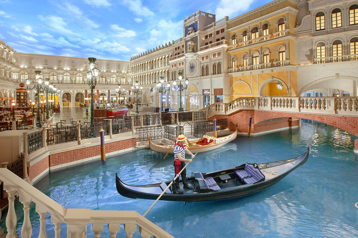Experience the charming gondolas inside The Venetian's Grand Canal Shoppes, a highlight among the best Vegas hotels.